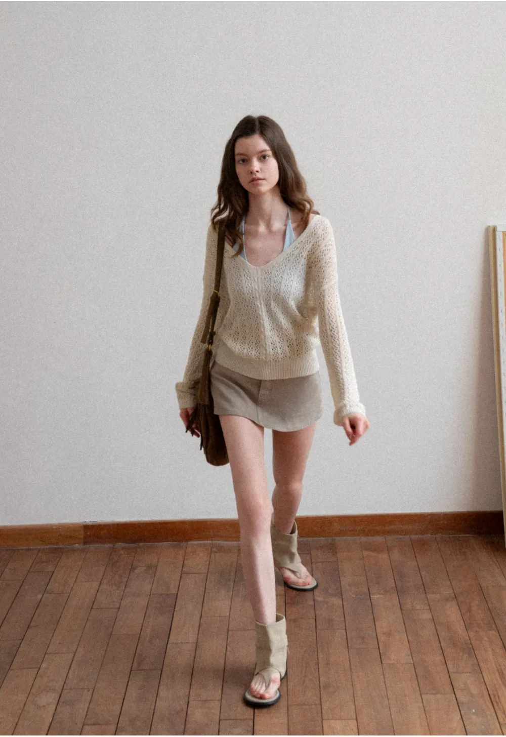 Crop tank top with halter neckline and thin straps