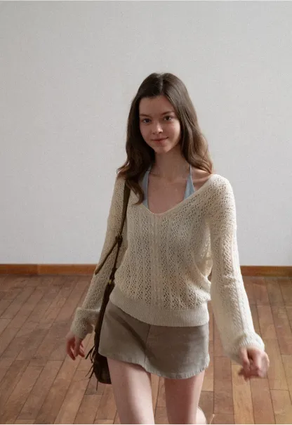 Crop tank top with halter neckline and thin straps