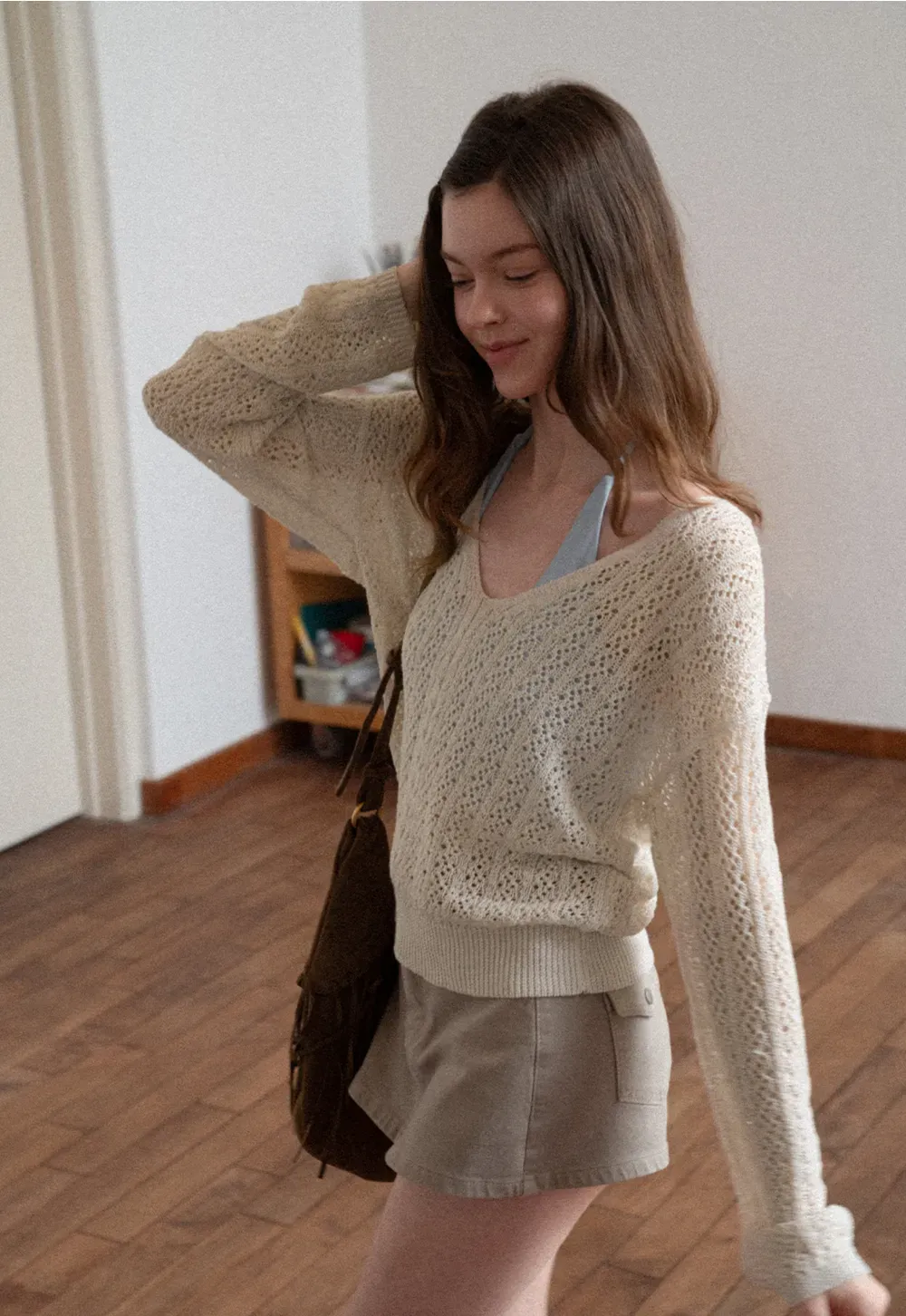 Crop tank top with halter neckline and thin straps