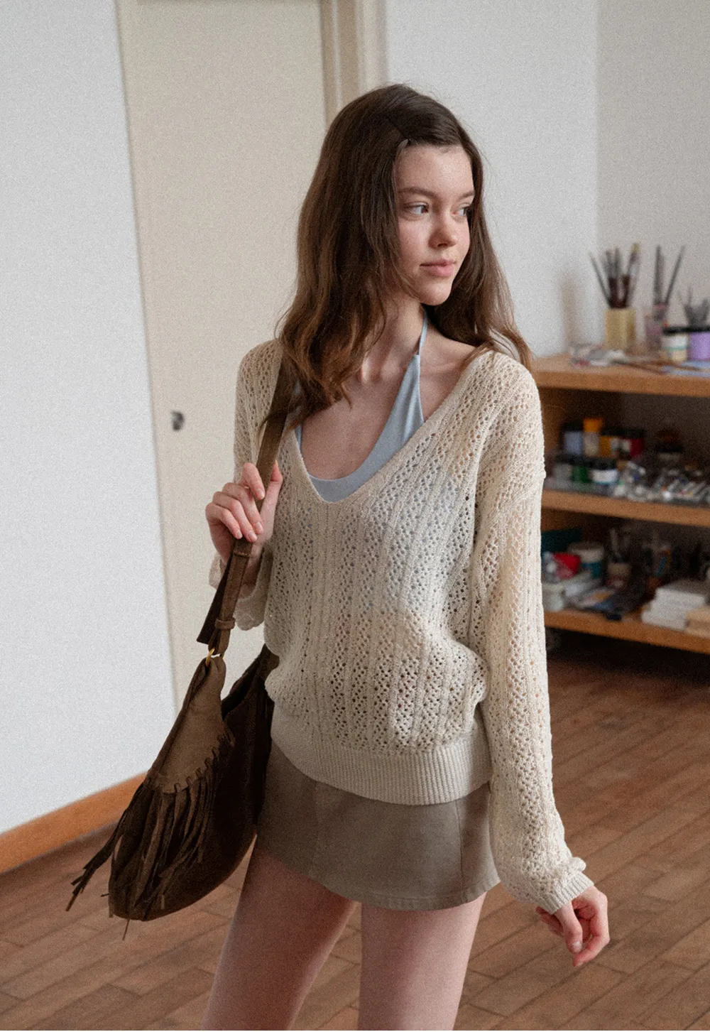 Crop tank top with halter neckline and thin straps