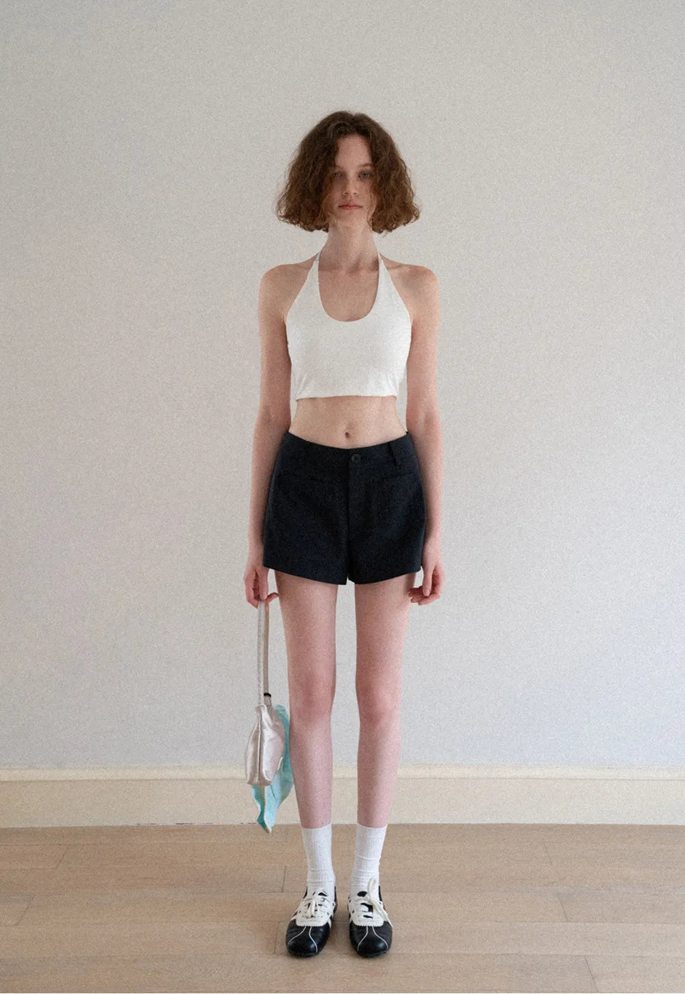 Crop tank top with halter neckline and thin straps