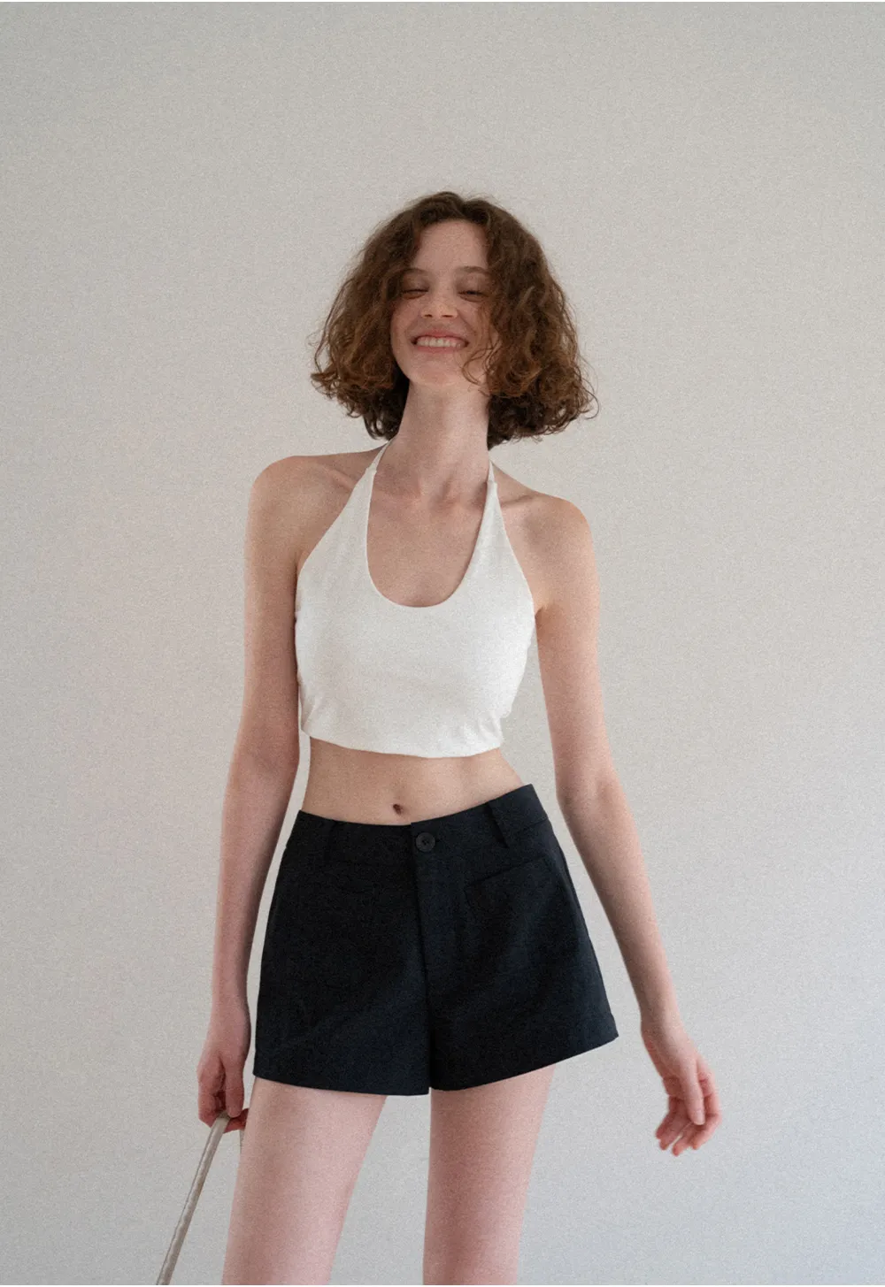 Crop tank top with halter neckline and thin straps