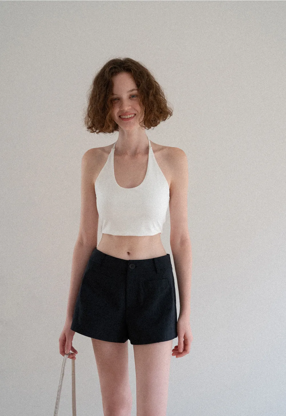 Crop tank top with halter neckline and thin straps