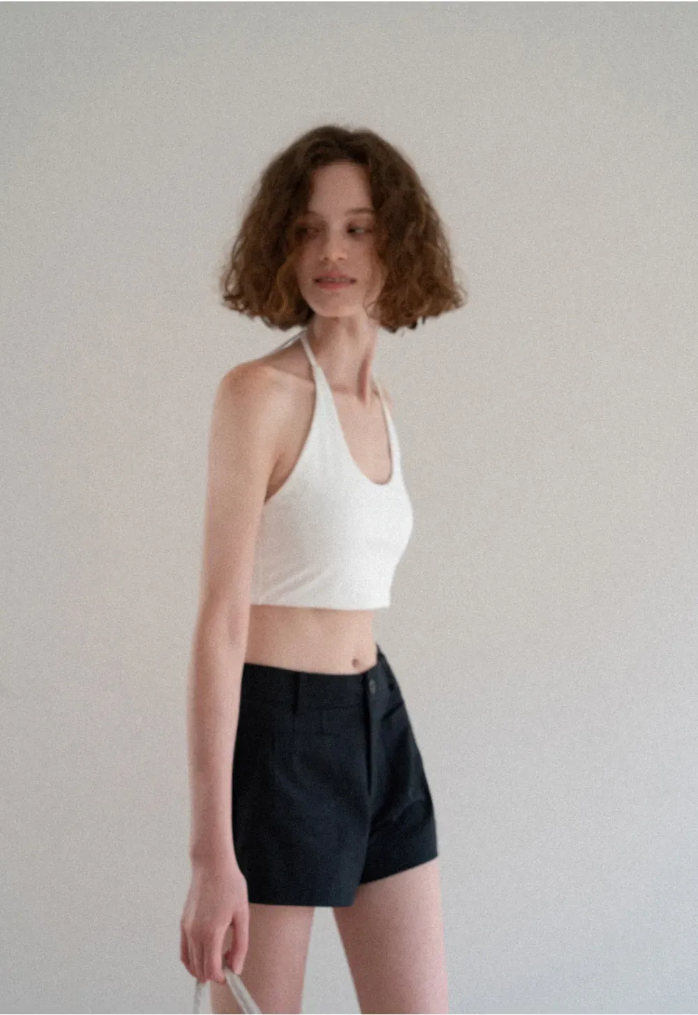 Crop tank top with halter neckline and thin straps