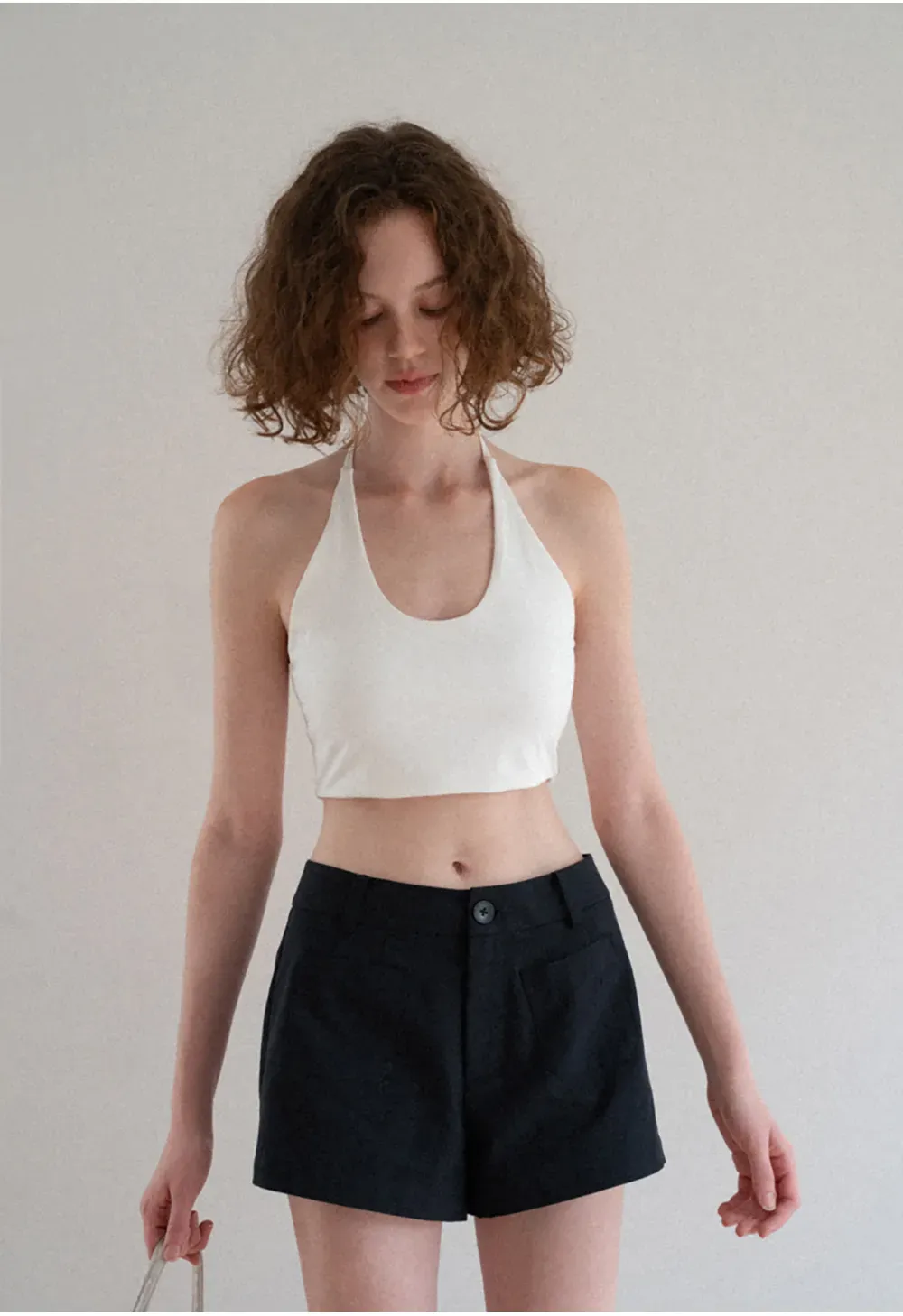 Crop tank top with halter neckline and thin straps