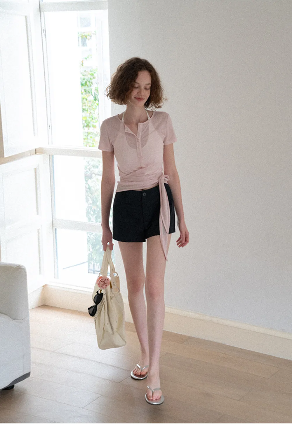 Crop tank top with halter neckline and thin straps