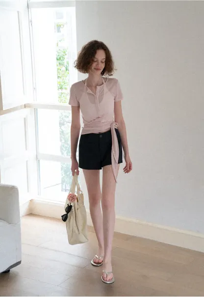 Crop tank top with halter neckline and thin straps