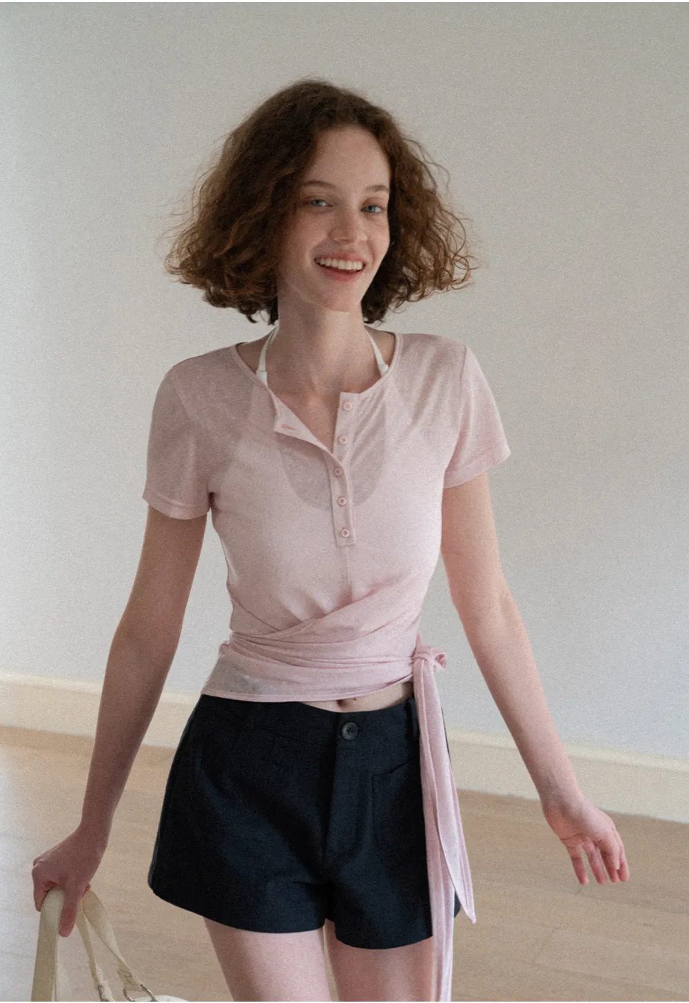 Crop tank top with halter neckline and thin straps