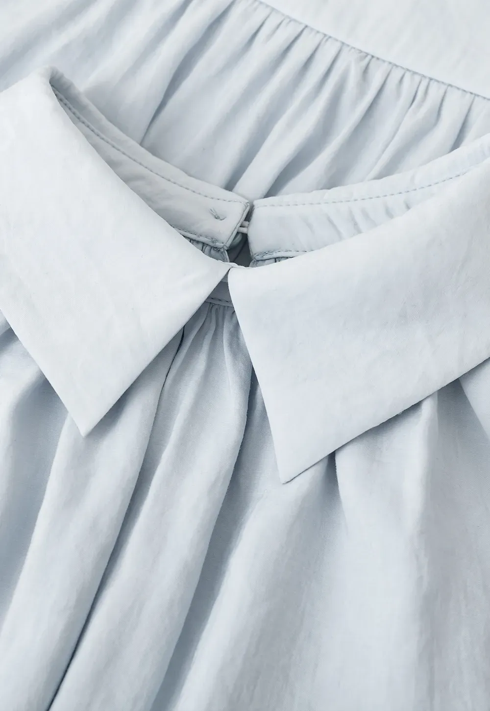 Collarless halter top with lace hem skirt