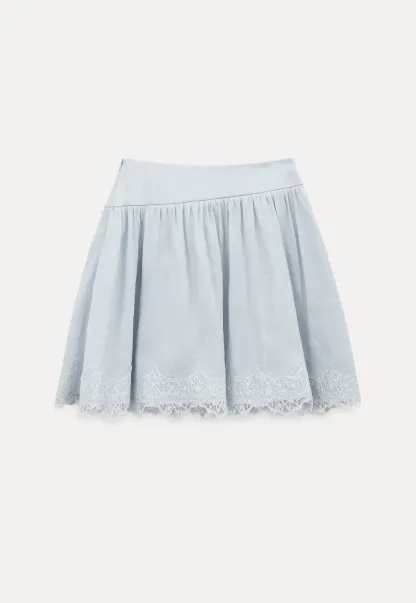 Collarless halter top with lace hem skirt