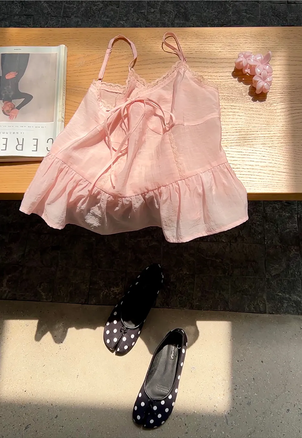 Sheer lace trim camisole with front tie and peplum hem