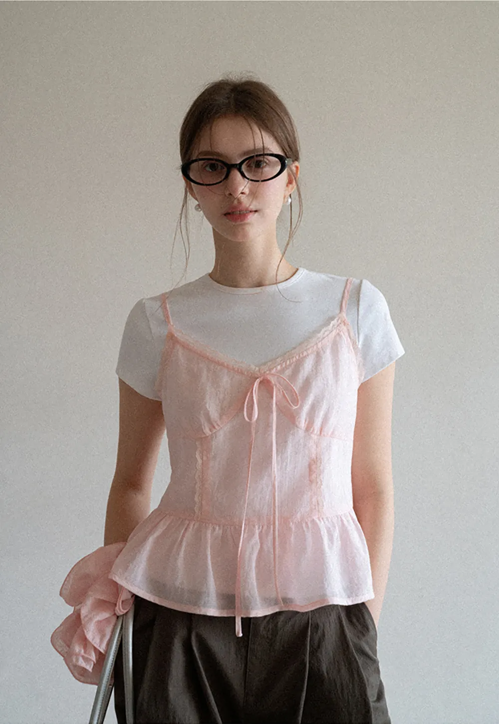 Sheer lace trim camisole with front tie and peplum hem