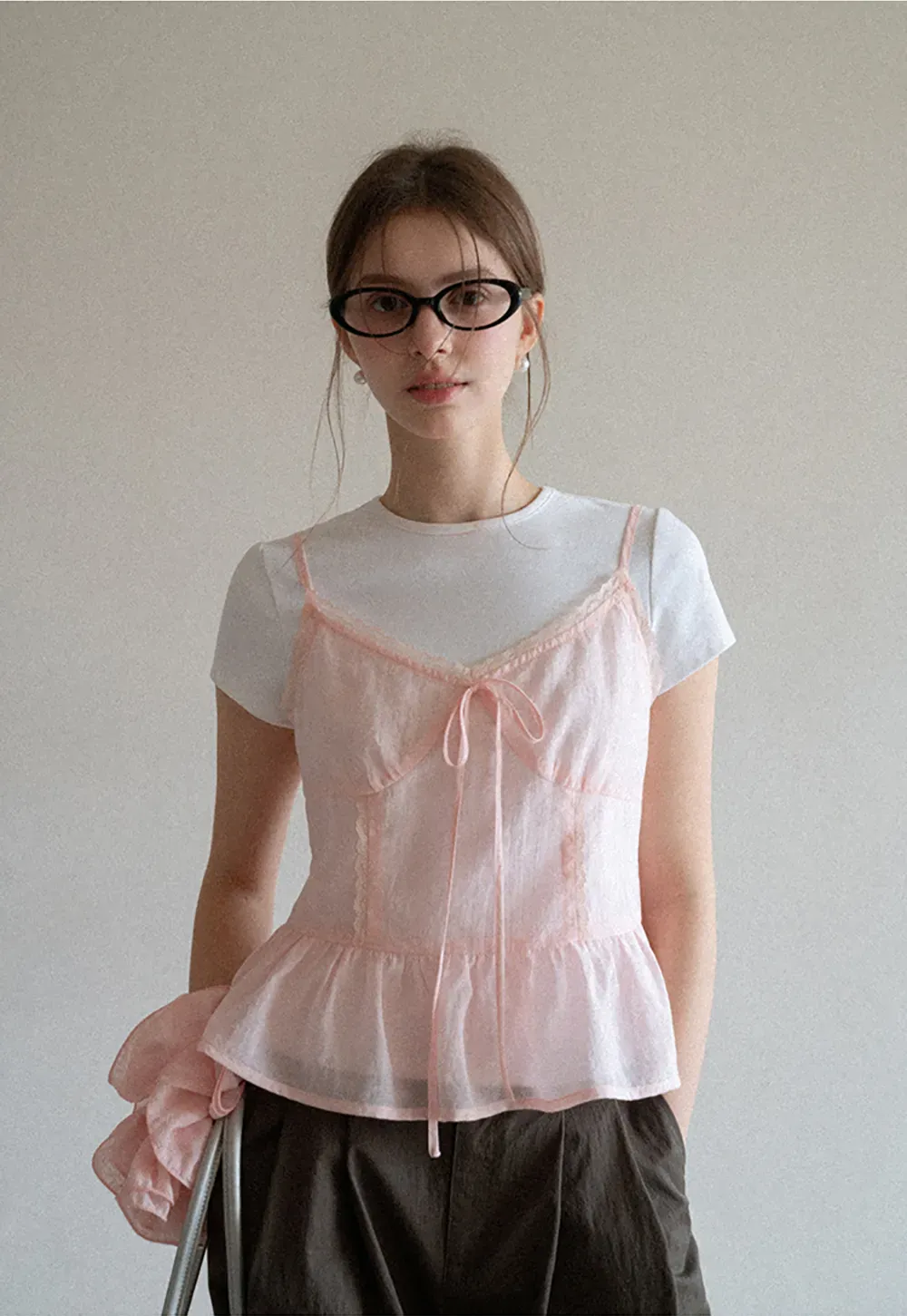 Sheer lace trim camisole with front tie and peplum hem