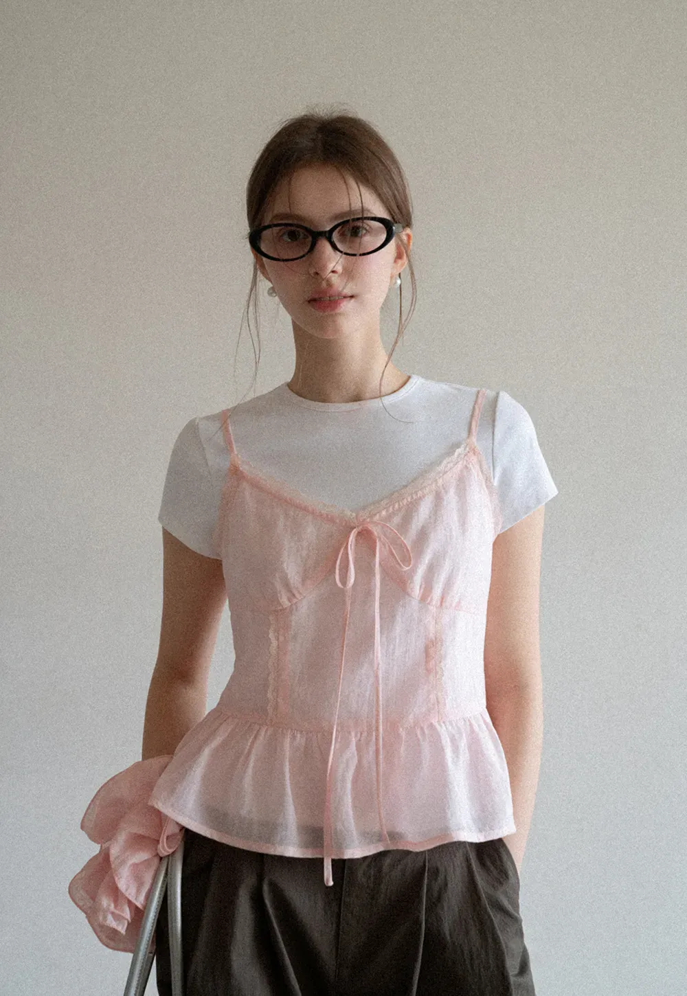 Sheer lace trim camisole with front tie and peplum hem