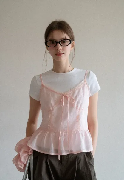 Sheer lace trim camisole with front tie and peplum hem