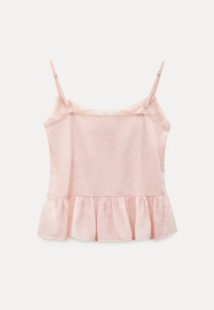 Sheer lace trim camisole with front tie and peplum hem