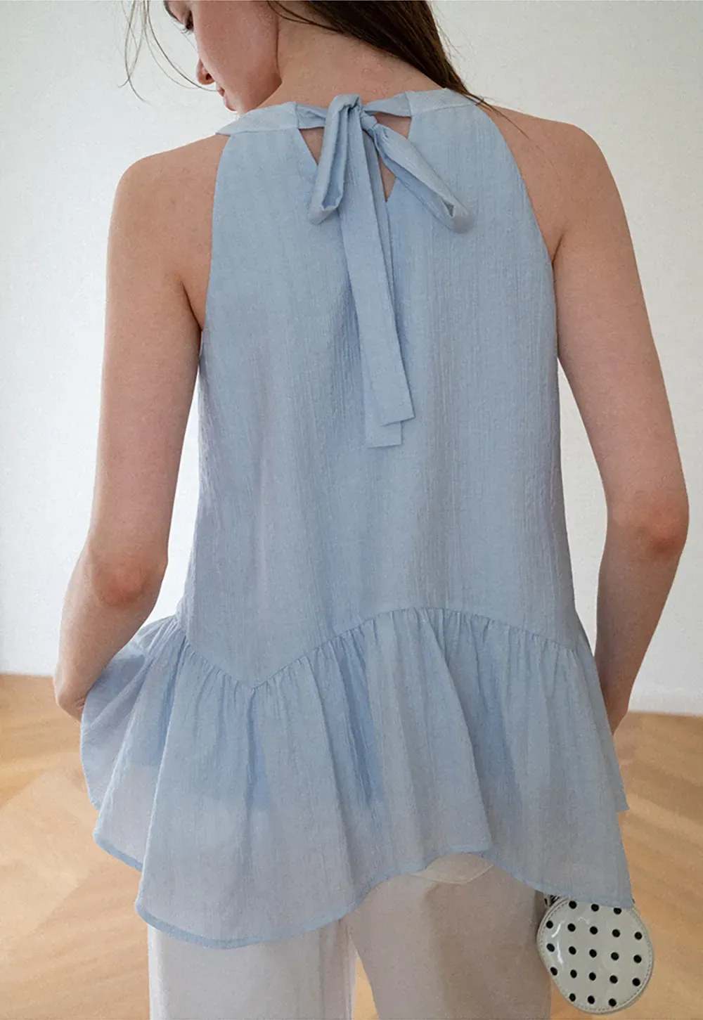 Ruffled Hem Sleeveless Top