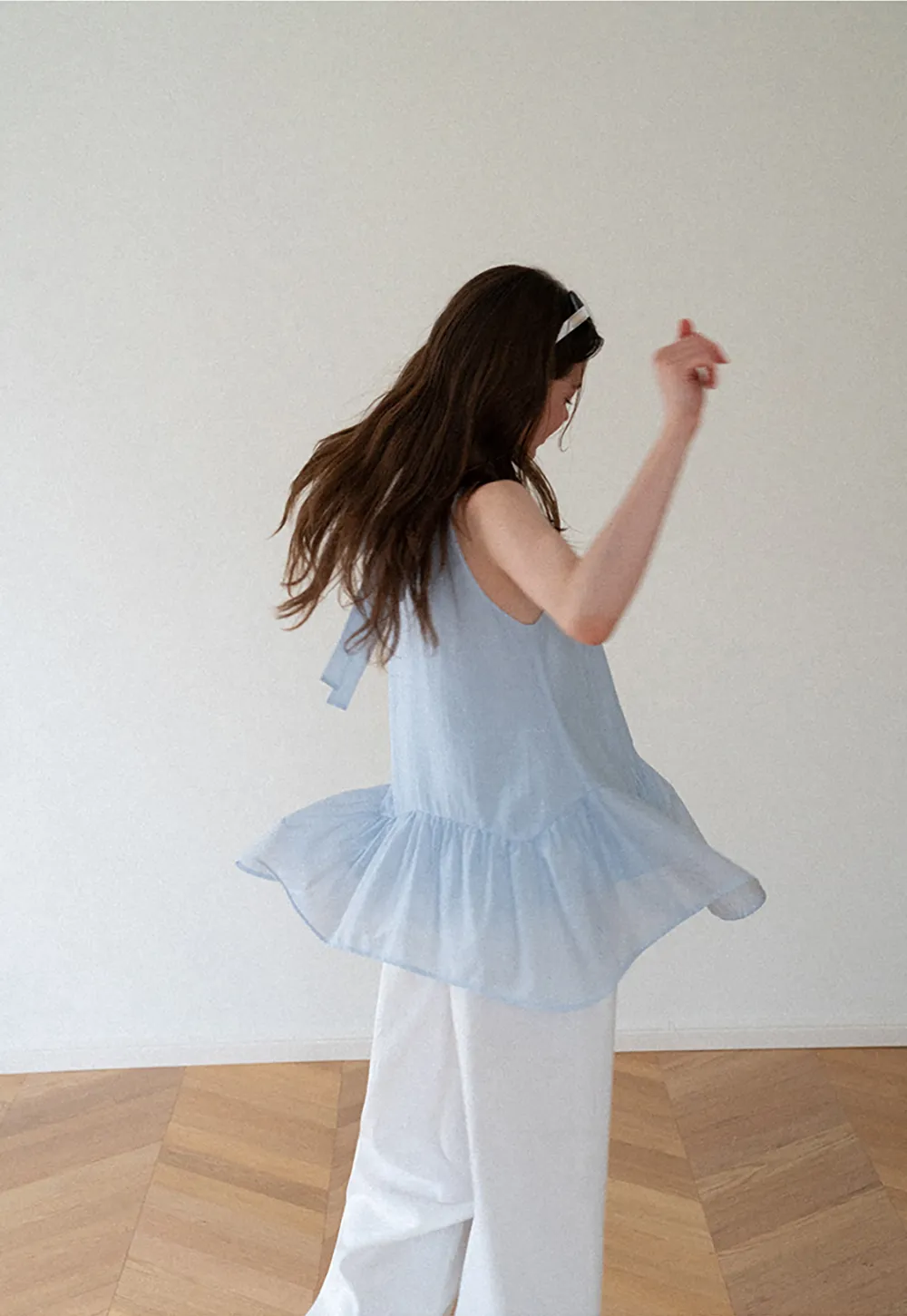 Ruffled Hem Sleeveless Top