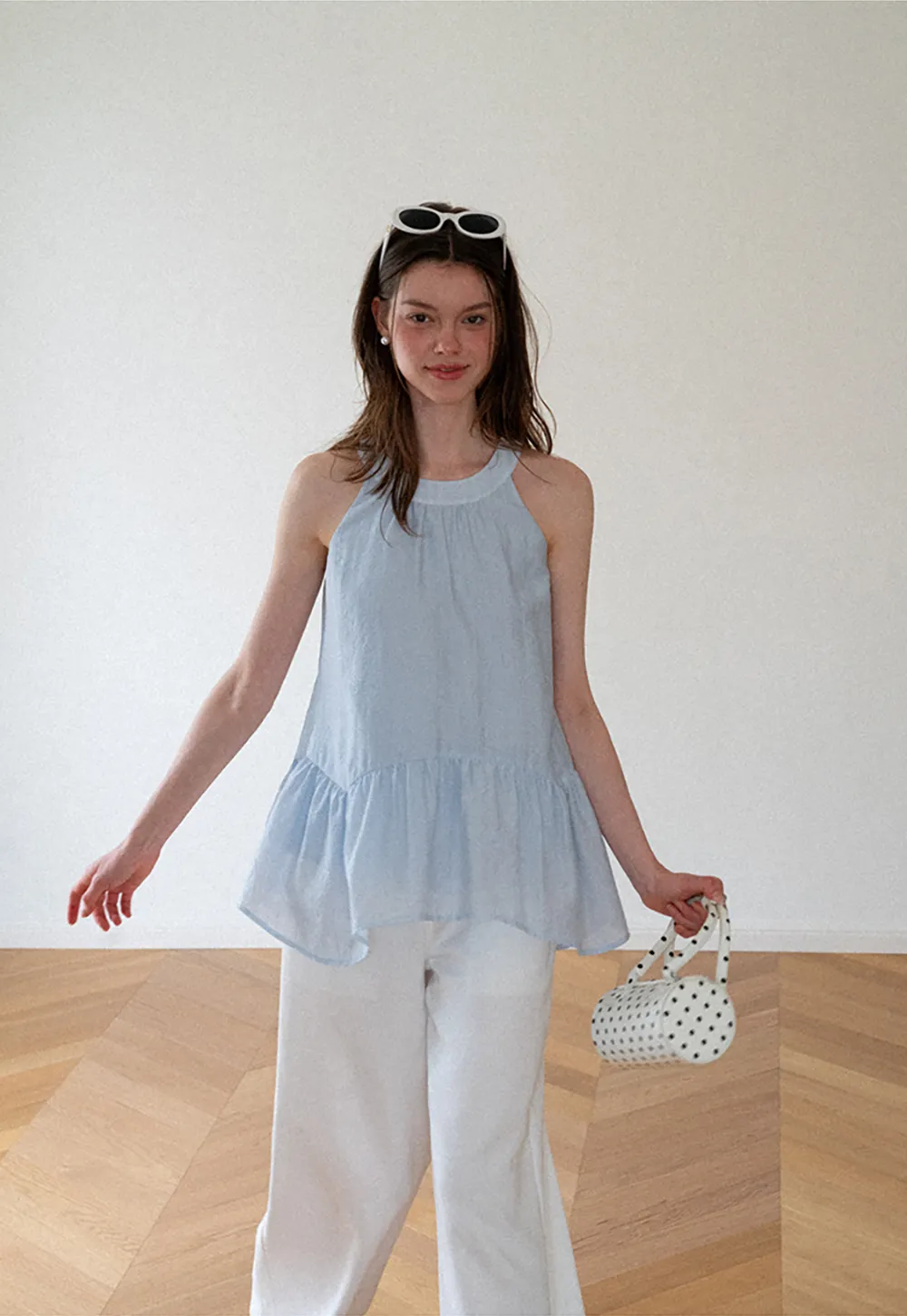 Ruffled Hem Sleeveless Top