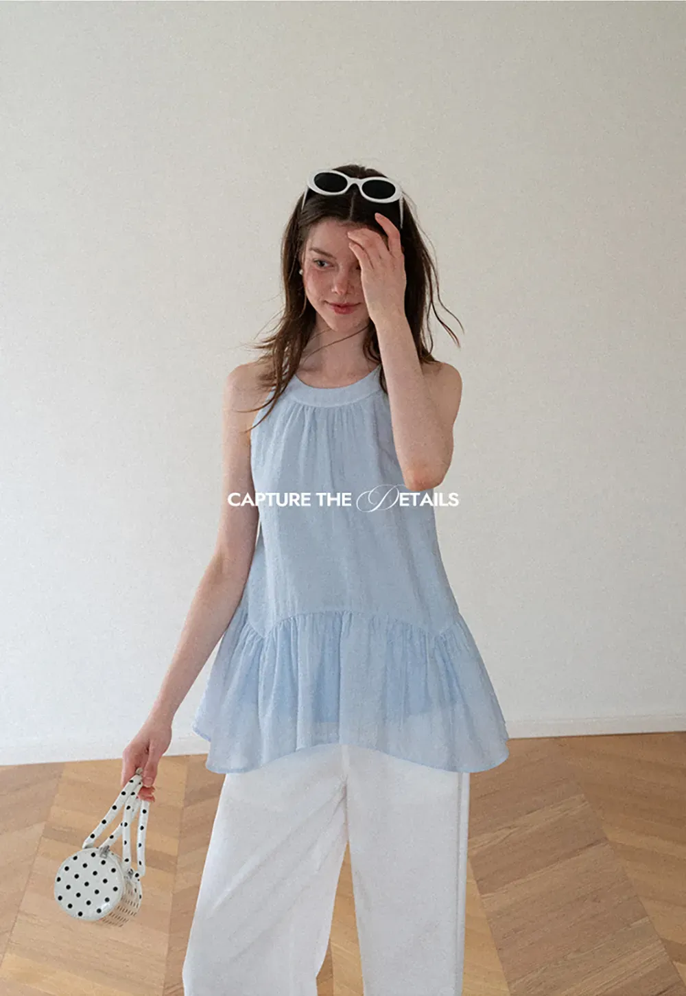 Ruffled Hem Sleeveless Top
