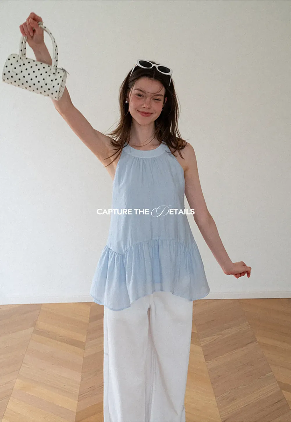 Ruffled Hem Sleeveless Top