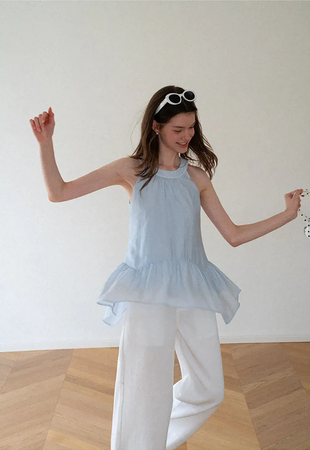 Ruffled Hem Sleeveless Top