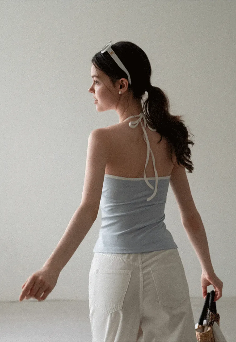 V Neck Sleeveless Knit Top With Ribbed Hem And Cropped Fit