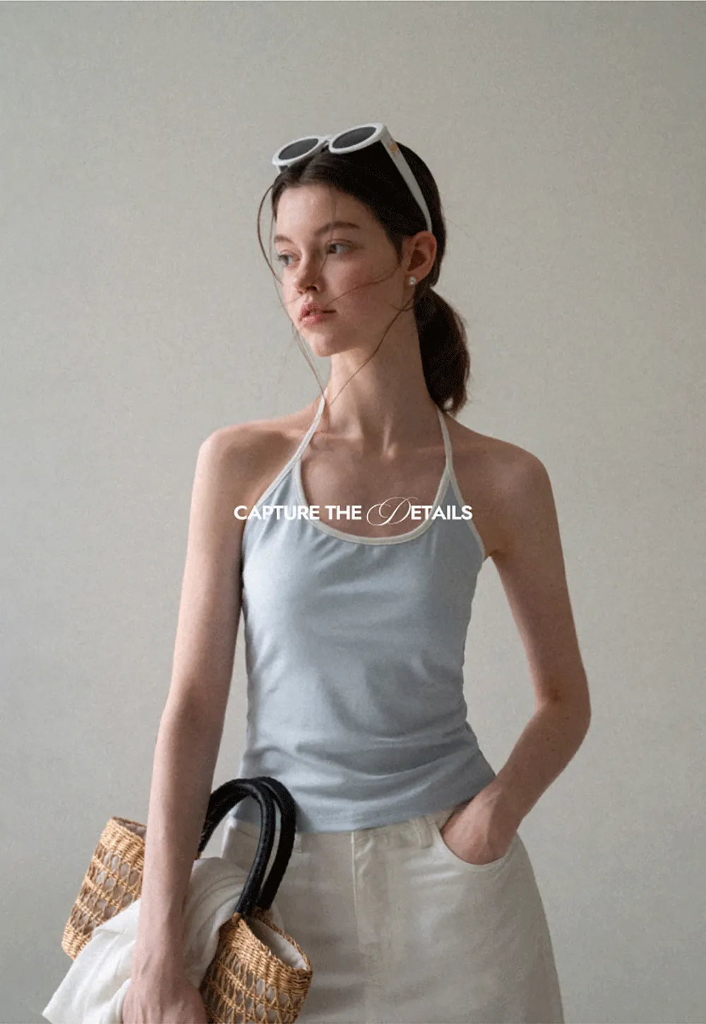 V Neck Sleeveless Knit Top With Ribbed Hem And Cropped Fit