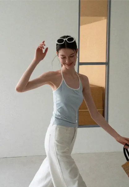 V Neck Sleeveless Knit Top With Ribbed Hem And Cropped Fit