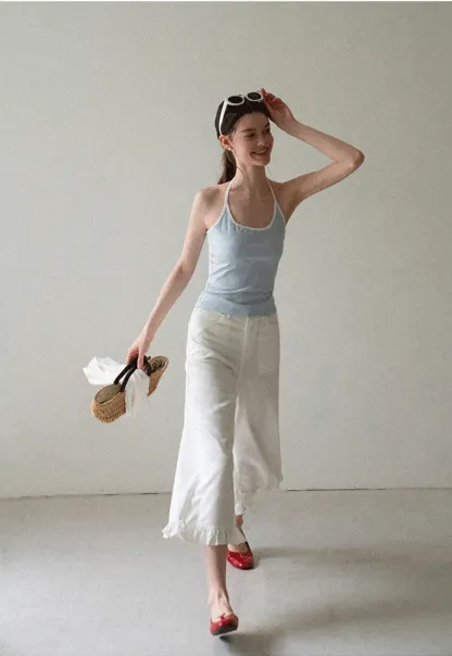 V Neck Sleeveless Knit Top With Ribbed Hem And Cropped Fit