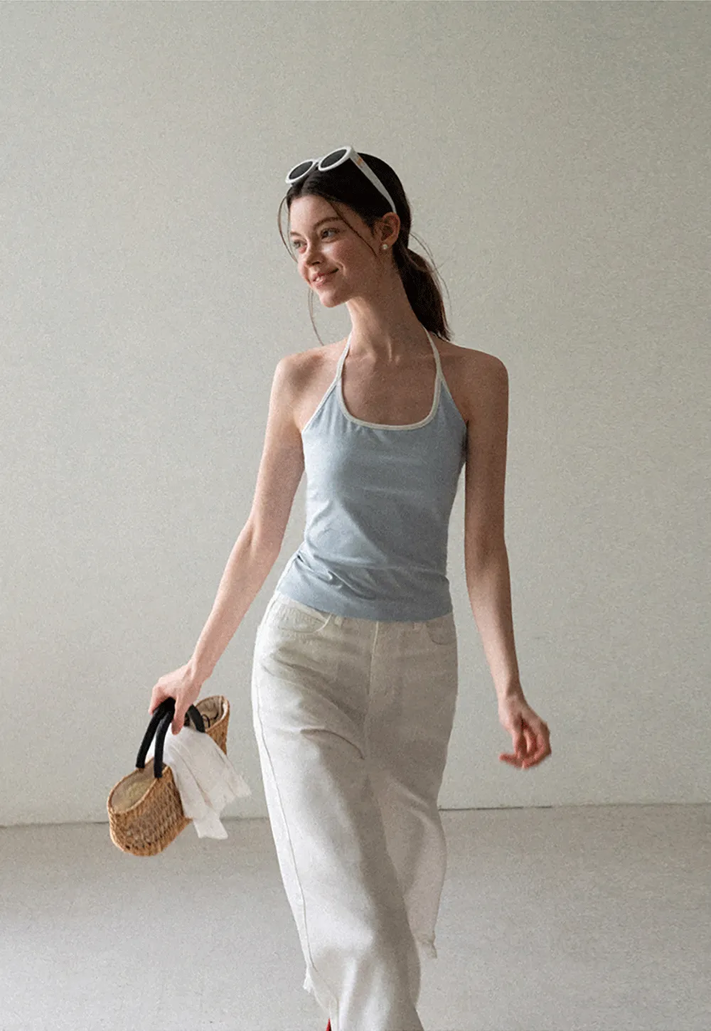 V Neck Sleeveless Knit Top With Ribbed Hem And Cropped Fit