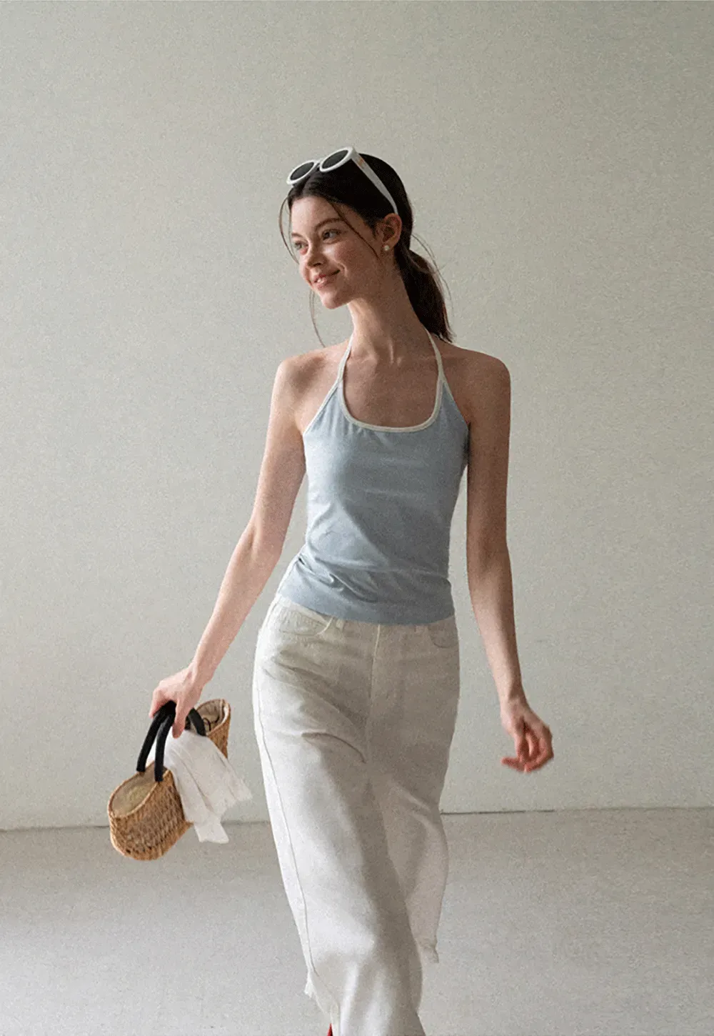 V Neck Sleeveless Knit Top With Ribbed Hem And Cropped Fit