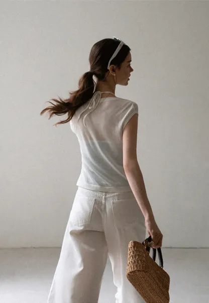 V Neck Sleeveless Knit Top With Ribbed Hem And Cropped Fit