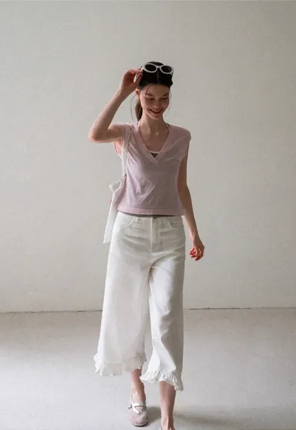 V Neck Sleeveless Knit Top With Ribbed Hem And Cropped Fit