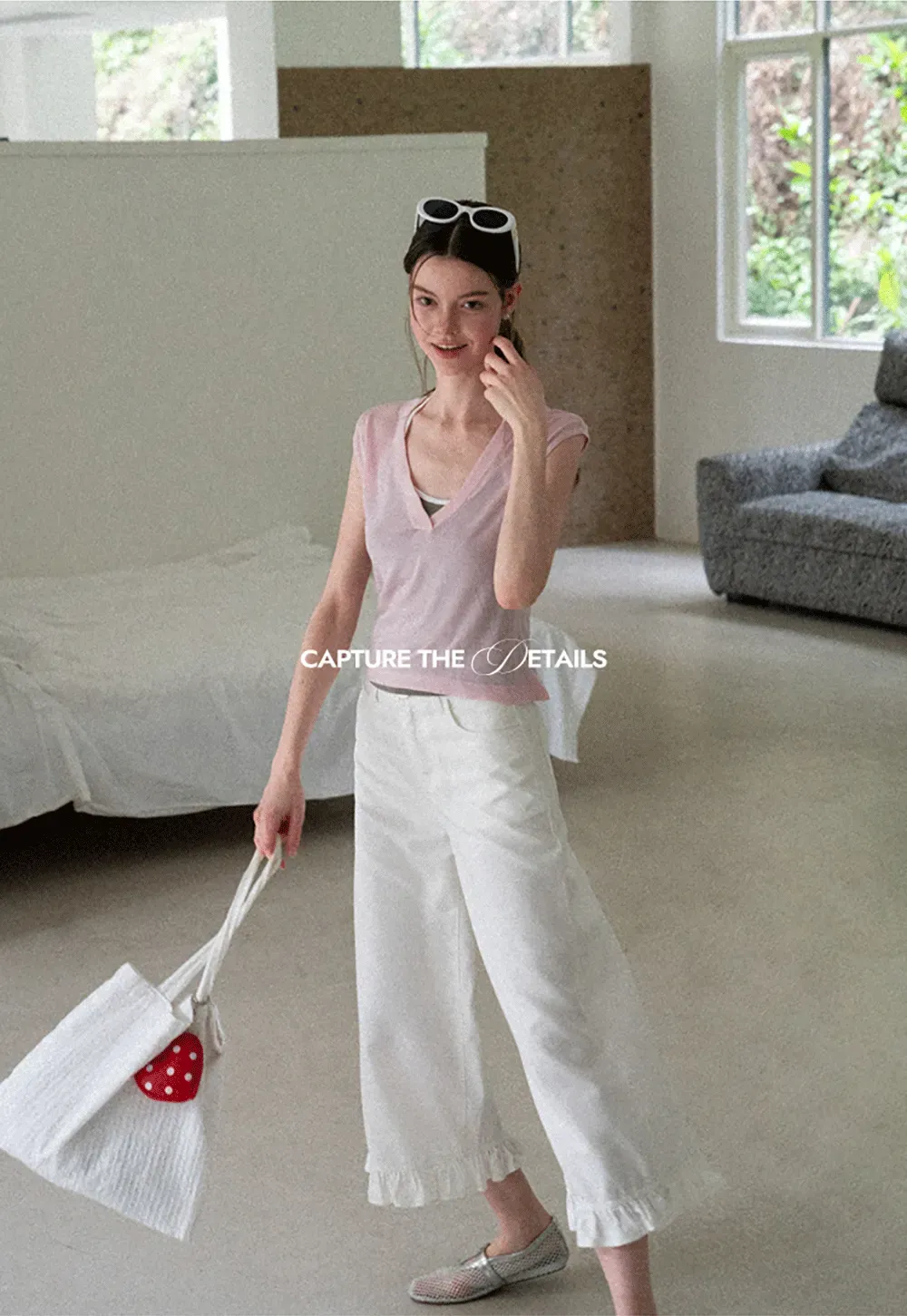 V Neck Sleeveless Knit Top With Ribbed Hem And Cropped Fit