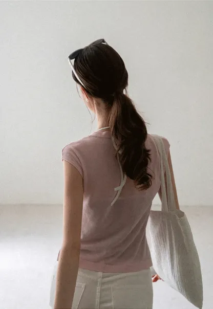 V Neck Sleeveless Knit Top With Ribbed Hem And Cropped Fit
