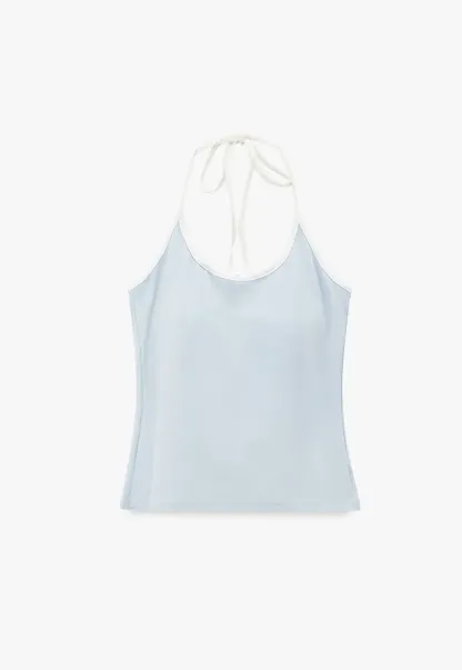 V Neck Sleeveless Knit Top With Ribbed Hem And Cropped Fit