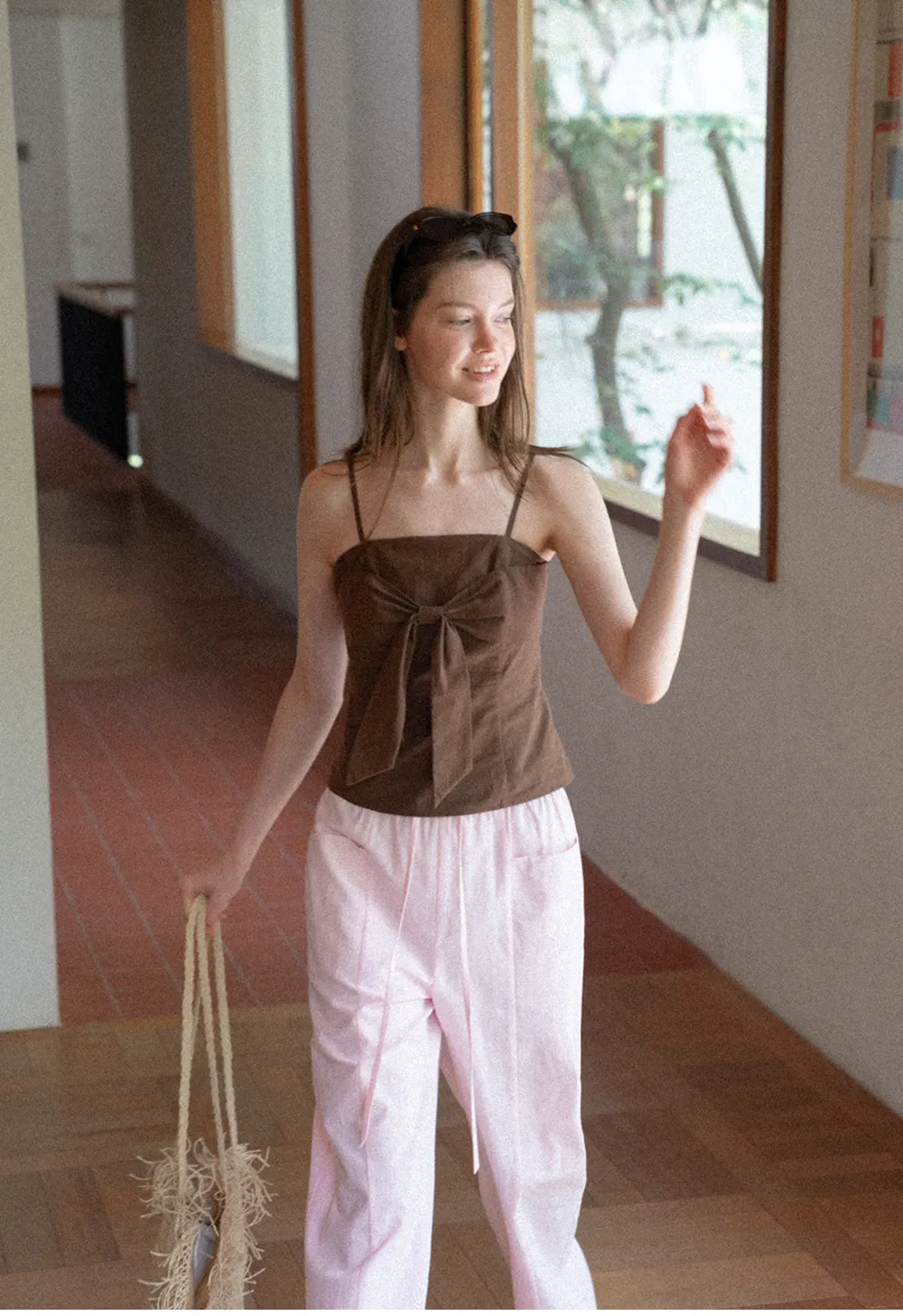 Áo hai dây thắt nơ phía trước