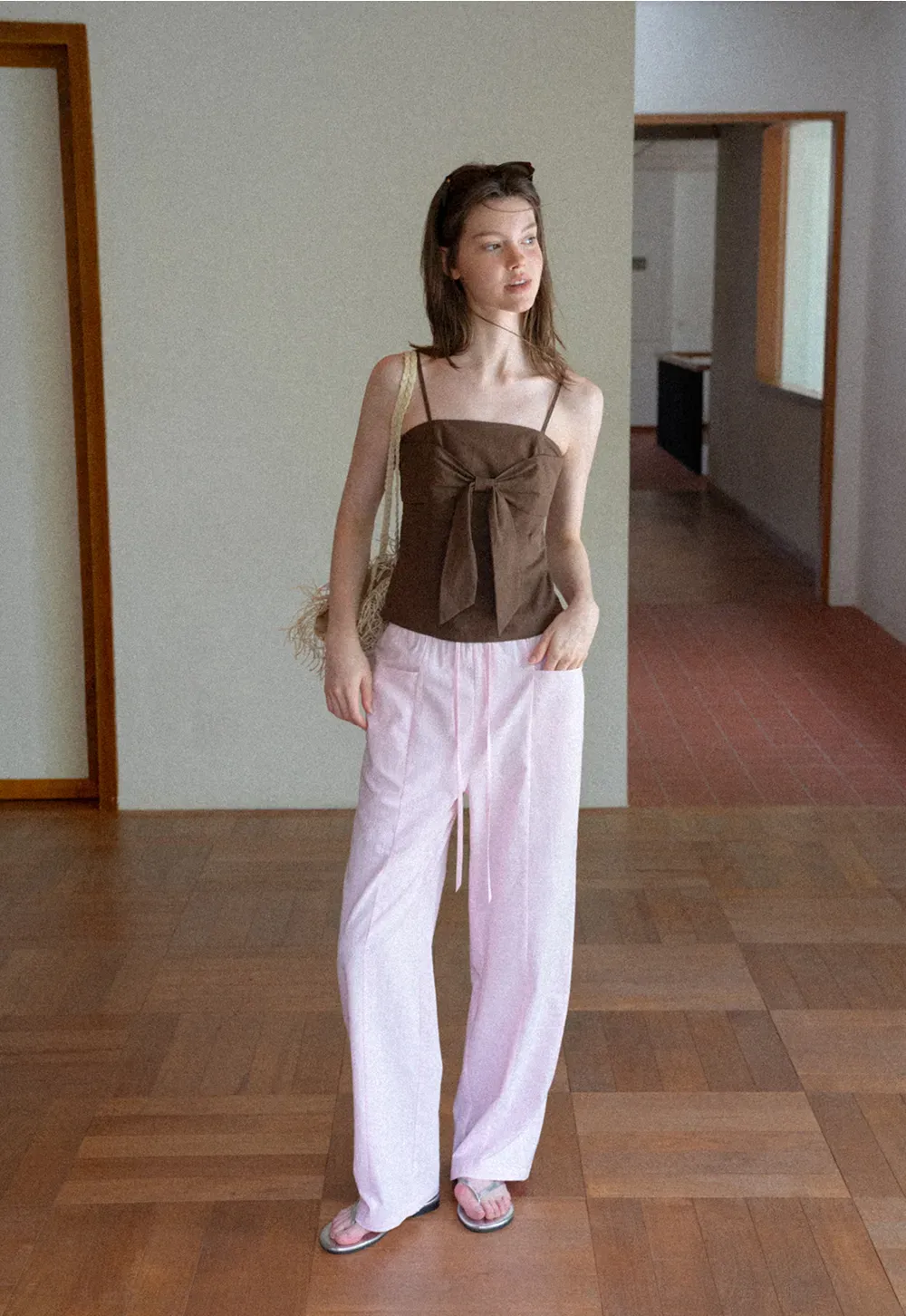 Áo hai dây thắt nơ phía trước