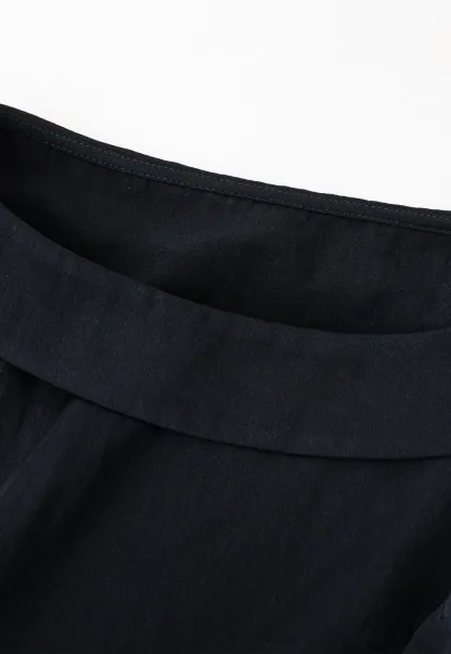 Peplum Hem Sleeveless Top and Pleated Skirt