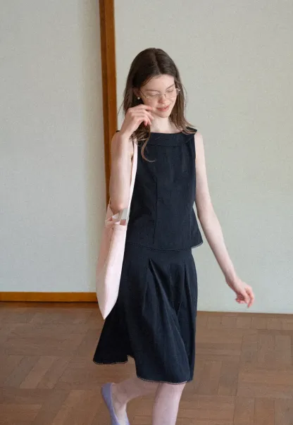 Peplum Hem Sleeveless Top and Pleated Skirt
