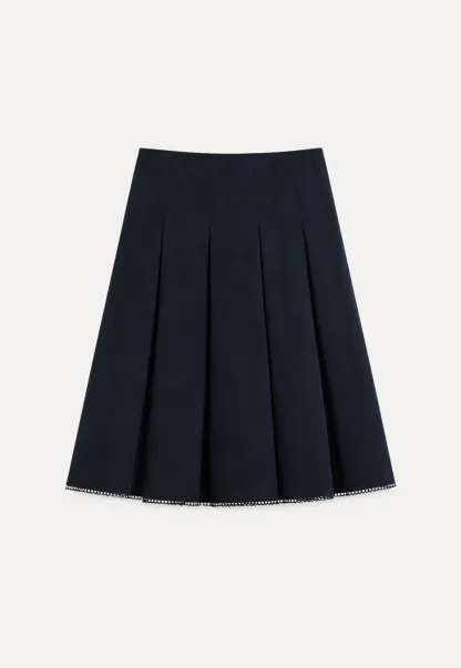 Peplum Hem Sleeveless Top and Pleated Skirt