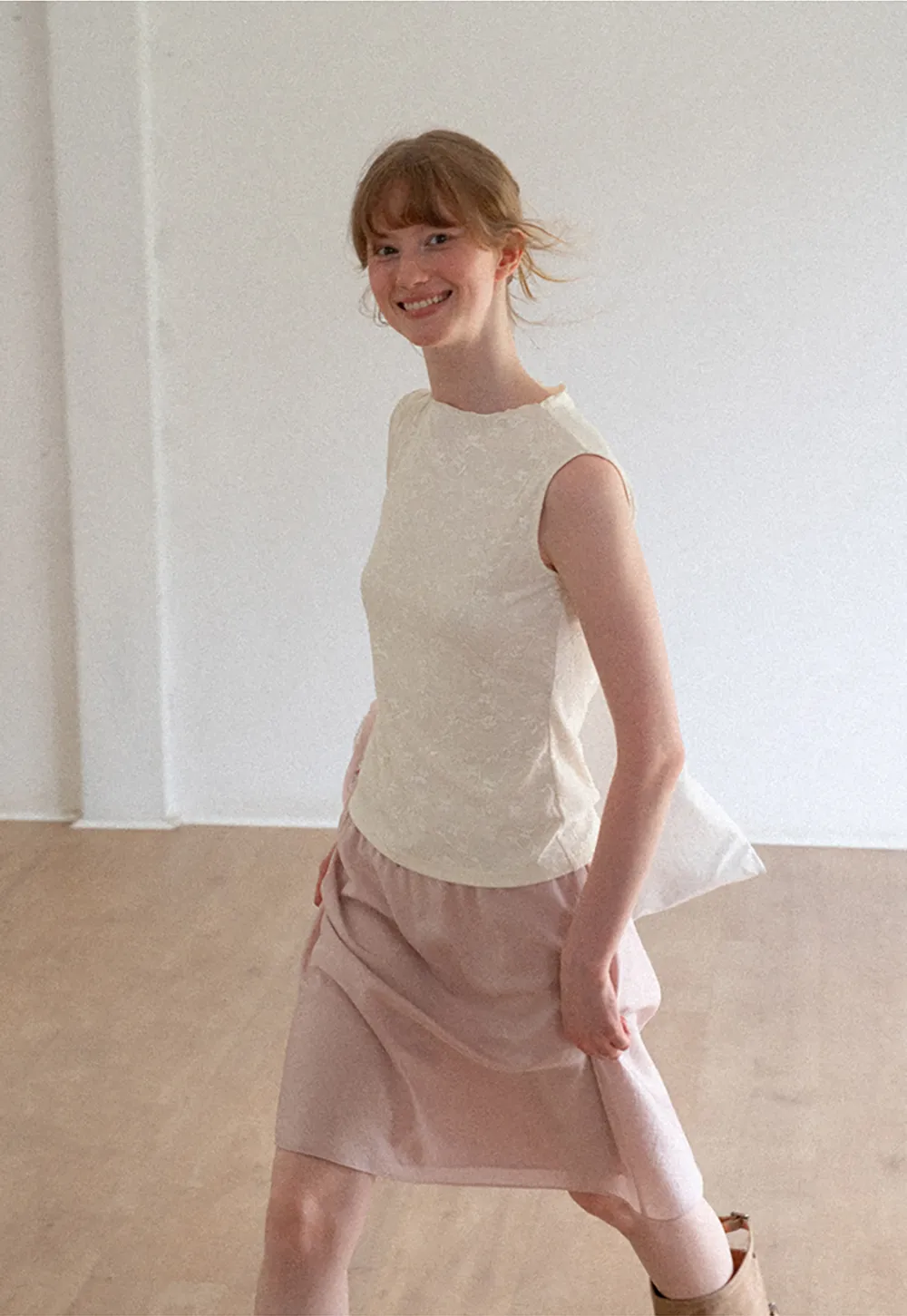 Textured Sleeveless Top with Asymmetrical Hem