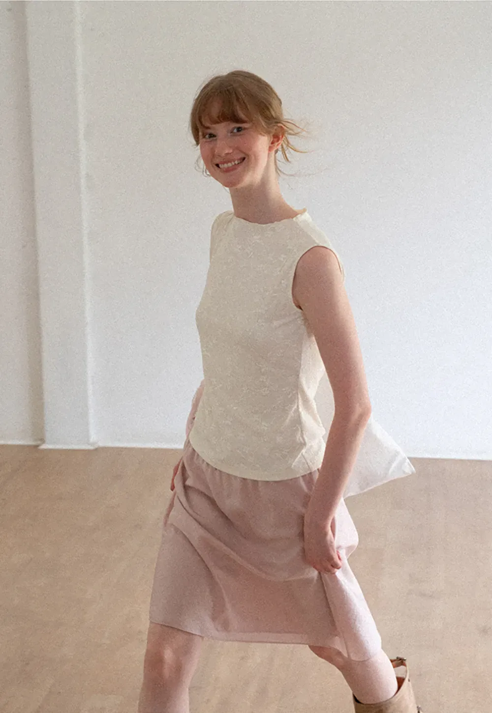 Textured Sleeveless Top with Asymmetrical Hem