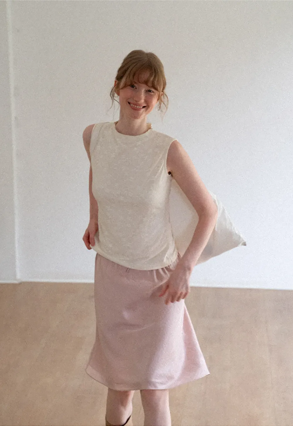 Textured Sleeveless Top with Asymmetrical Hem
