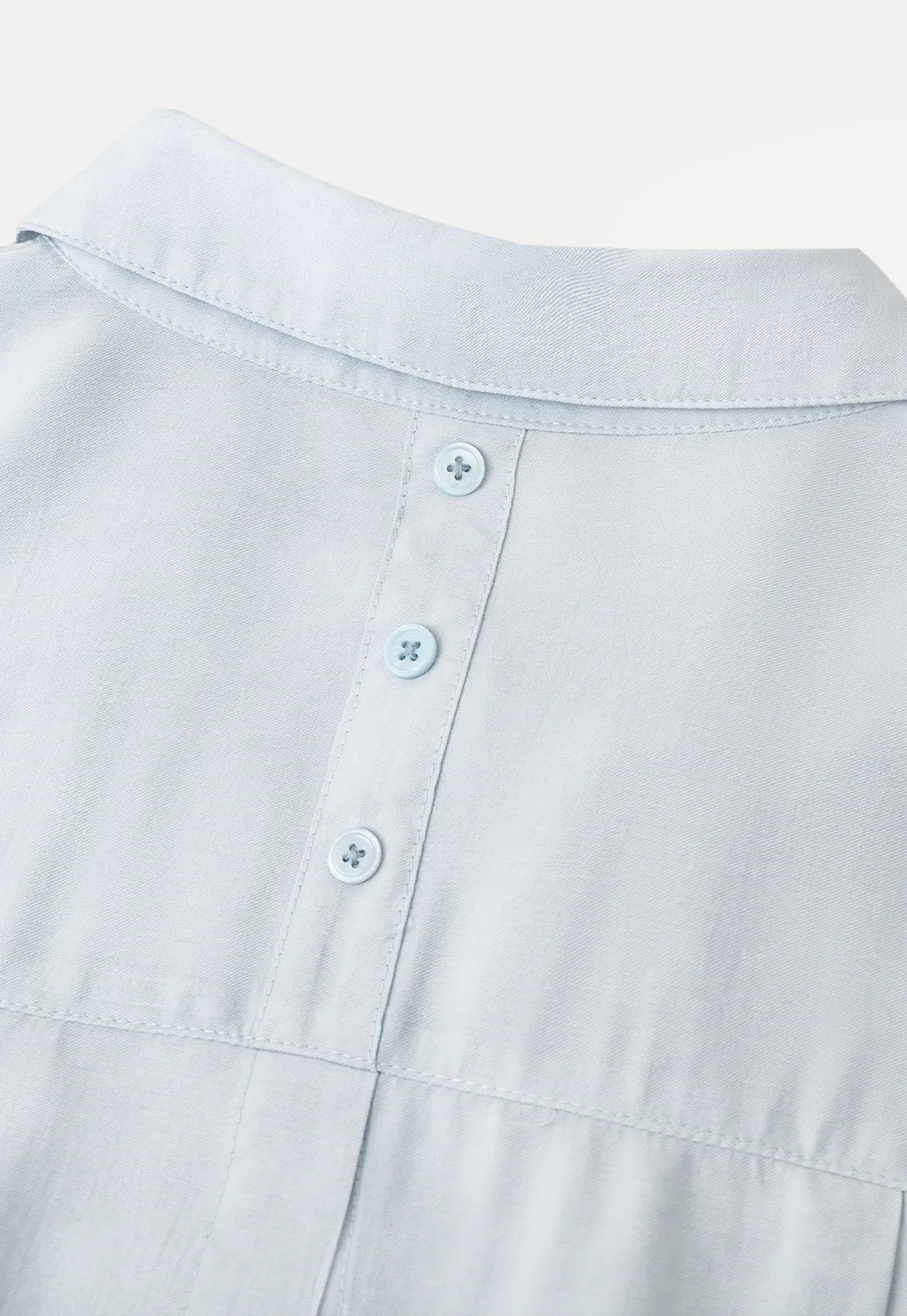 Oversized shirt with back tie detail and button placket