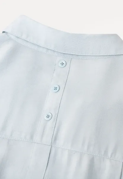 Oversized shirt with back tie detail and button placket