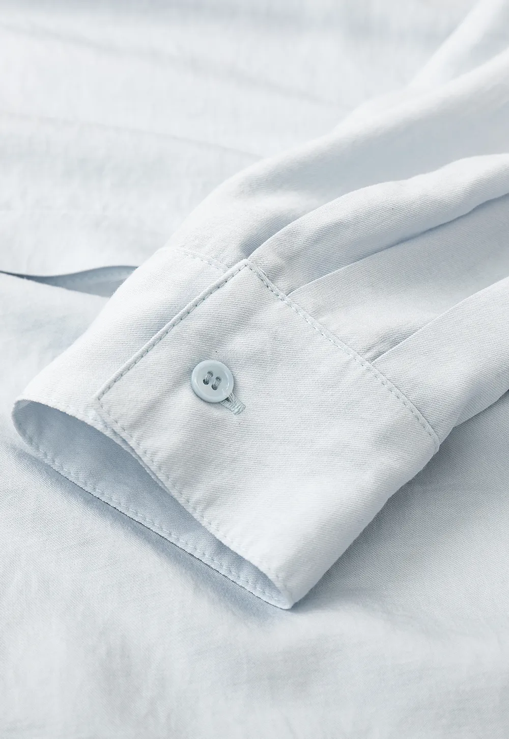 Oversized shirt with back tie detail and button placket