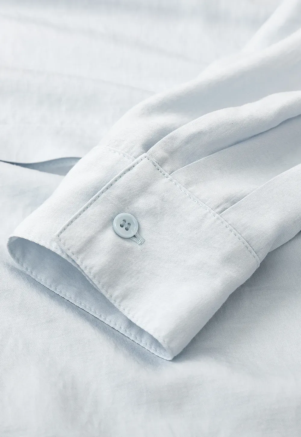 Oversized shirt with back tie detail and button placket