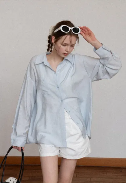 Oversized shirt with back tie detail and button placket